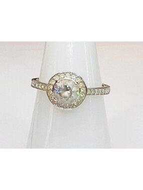 Size 7 ring stamped 55 clear stones silver color  band